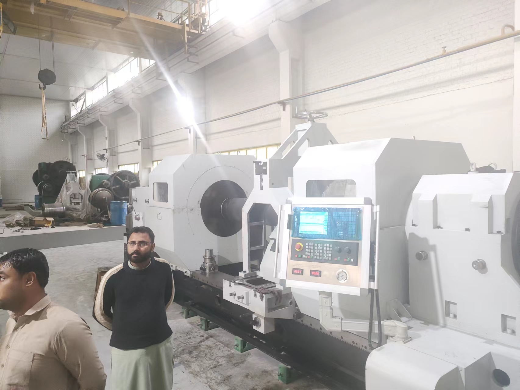 Engineers is installing deep hole drilling machine in Pakistan